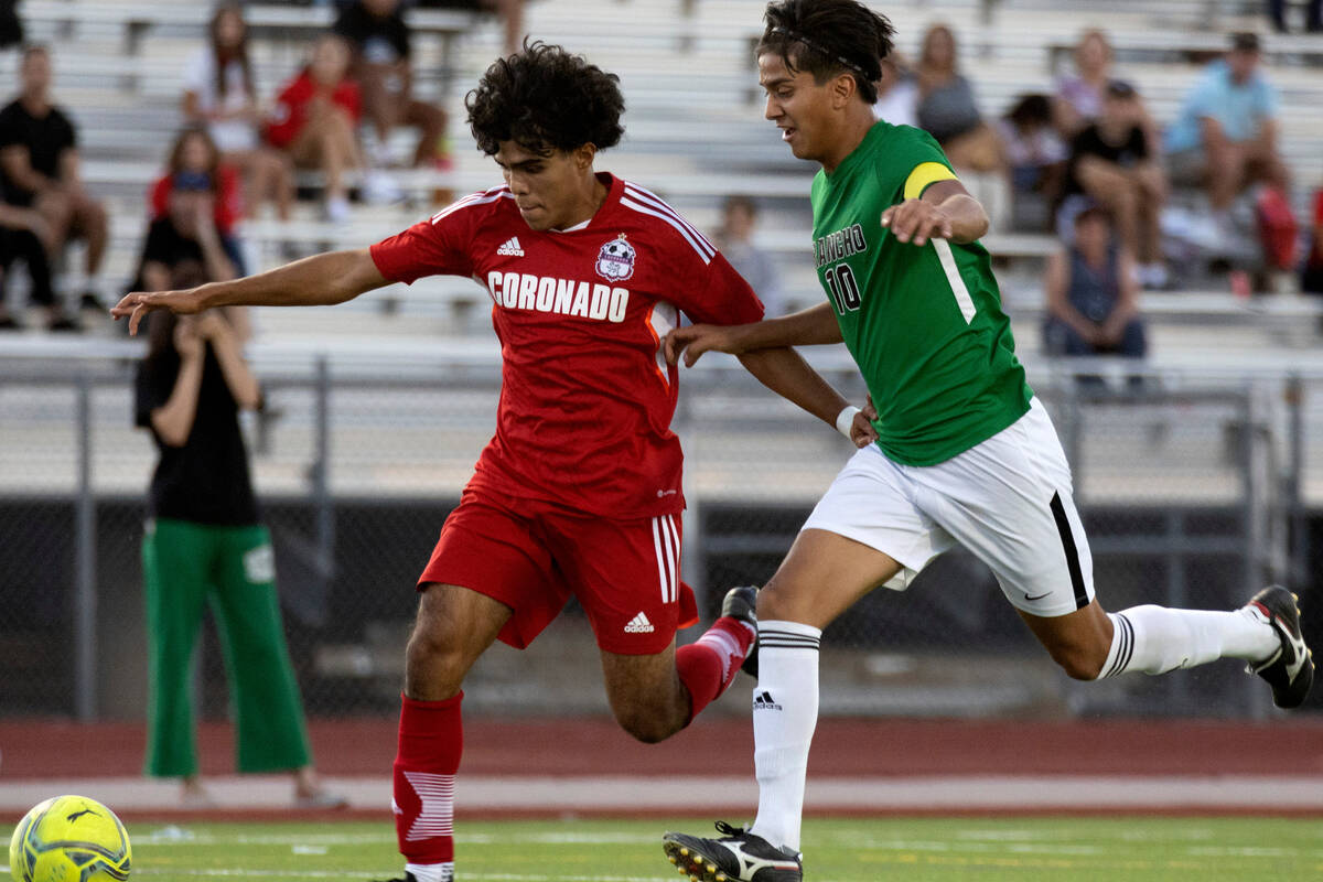 Coronado’s Francisco Avila, left, attempts to score while Rancho’s Cesar Patricio ...