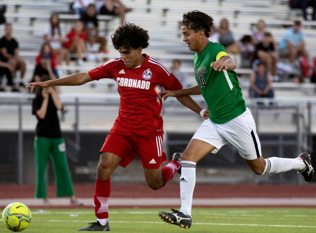 Coronado’s Francisco Avila, left, attempts to score while Rancho’s Cesar Patricio ...