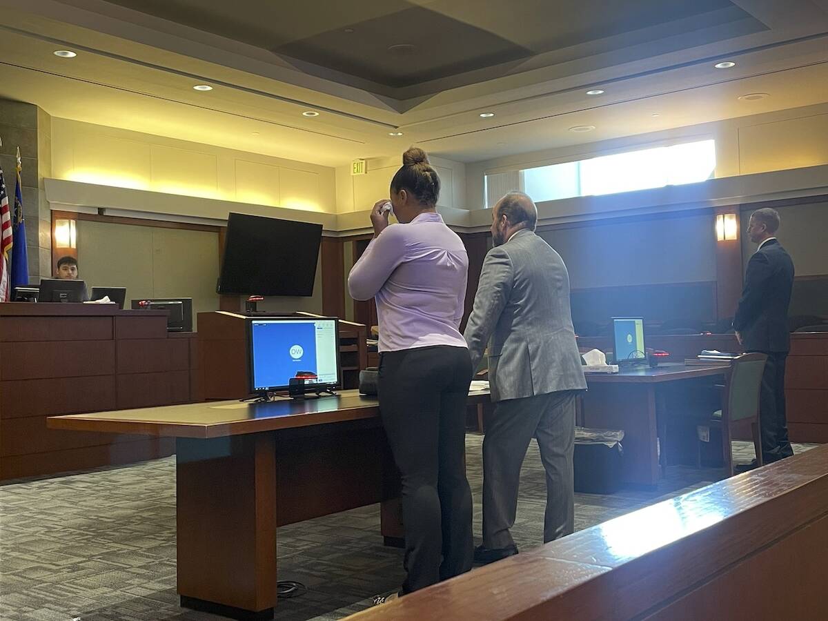 (Left) Daysia Brown, 25, standing in court next defense attorney (right) Kenneth Frizzell on Th ...
