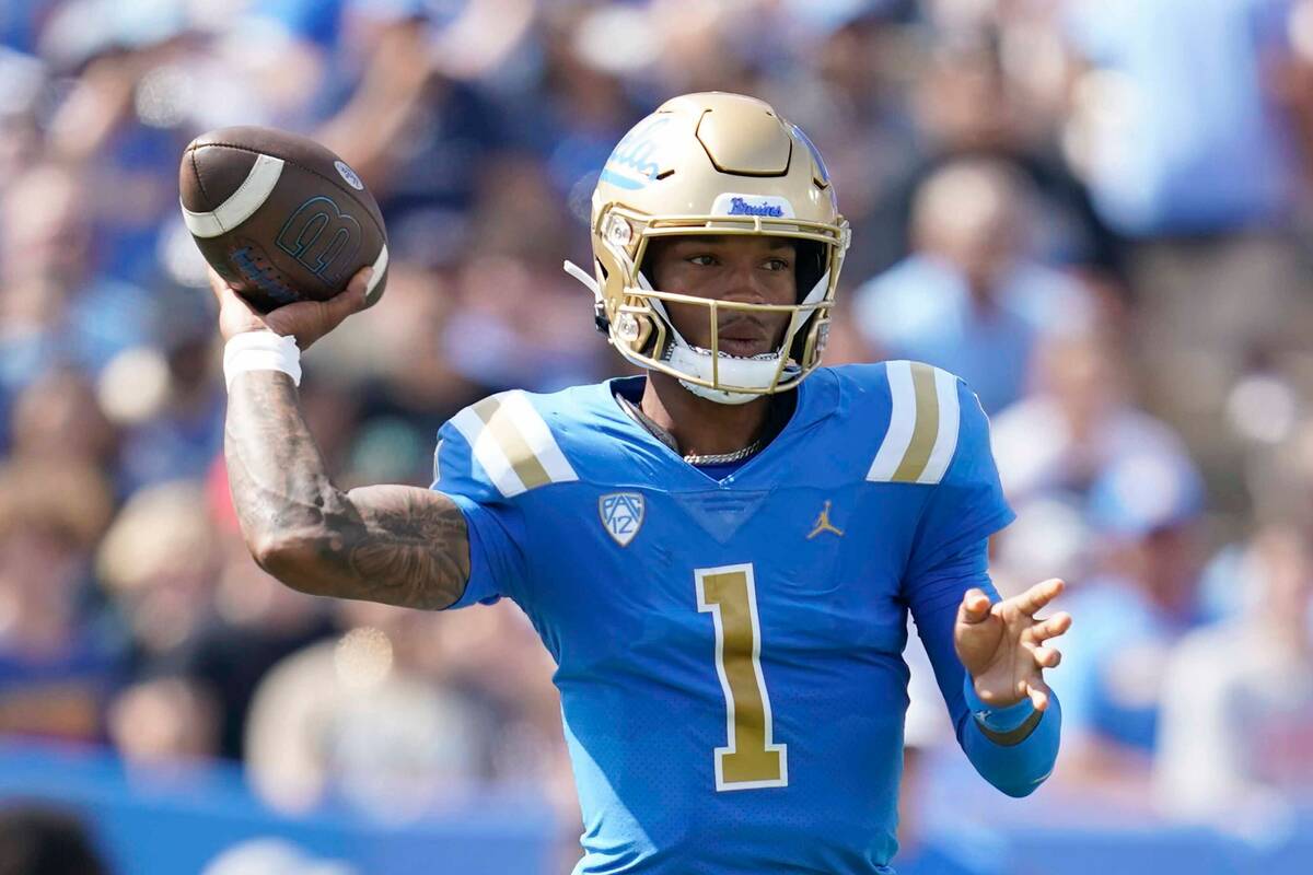 UCLA quarterback Dorian Thompson-Robinson (1) throws during an NCAA college football game again ...