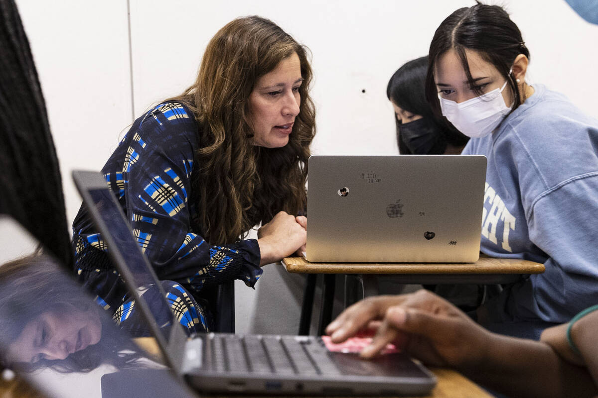 Lt. Gov. Lisa Cano Burkhead, left, works with Breanna Ramirez, a sophomore, as she returns to t ...