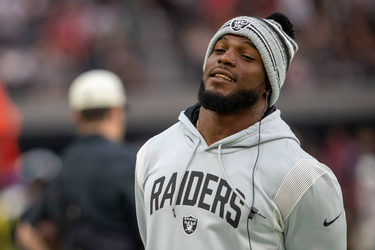 Raiders linebacker Denzel Perryman reacts watching his team play the Arizona Cardinals during t ...