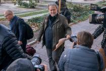 Steve Bannon, center, a longtime ally of former President Donald Trump, convicted of contempt o ...