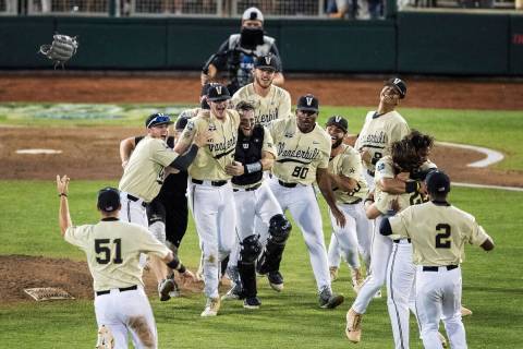 Vanderbilt celebrates an 8-2 win over Michigan during the deciding game of the NCAA College Wor ...