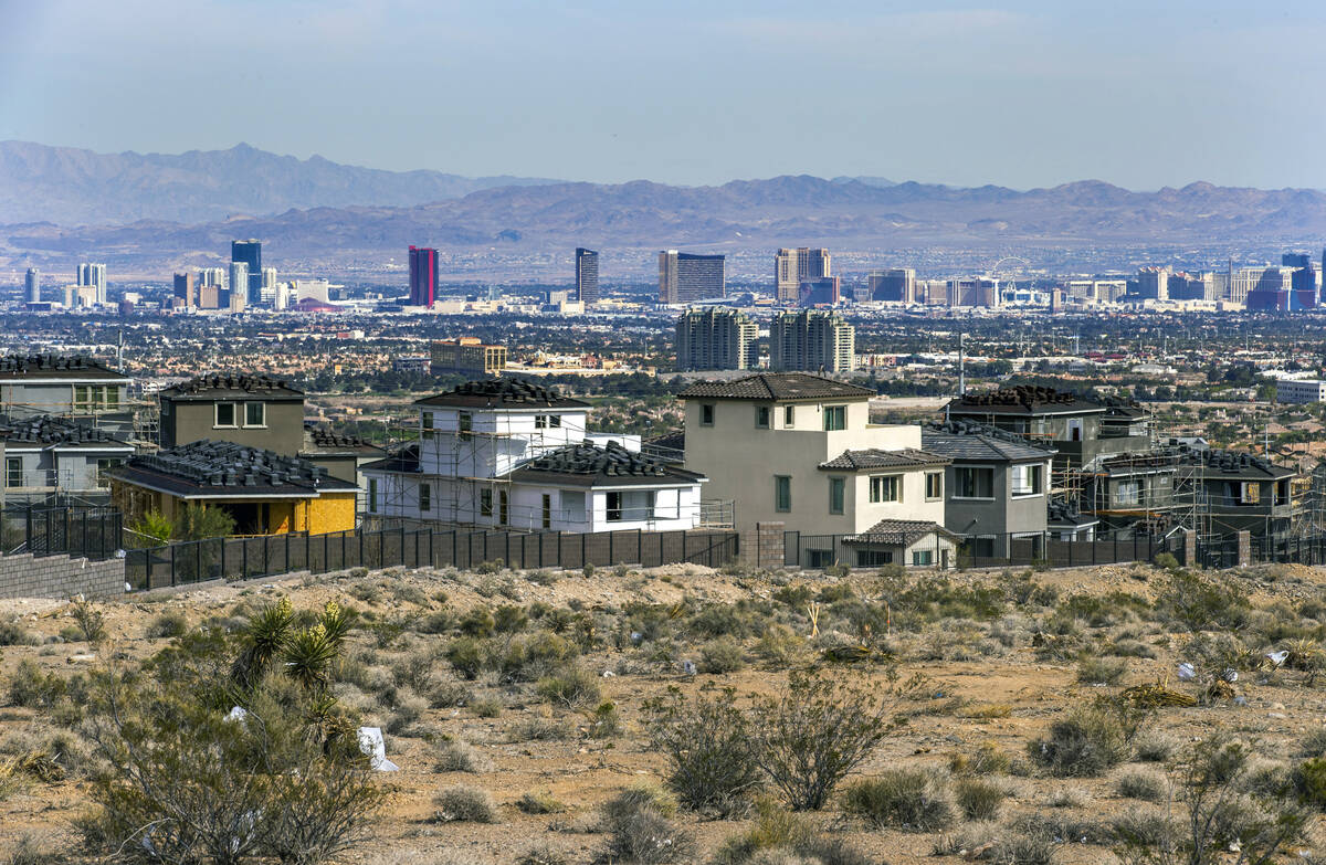 New homes under construction near West Redpoint Drive and Desert Foothills Drive on Wednesday, ...