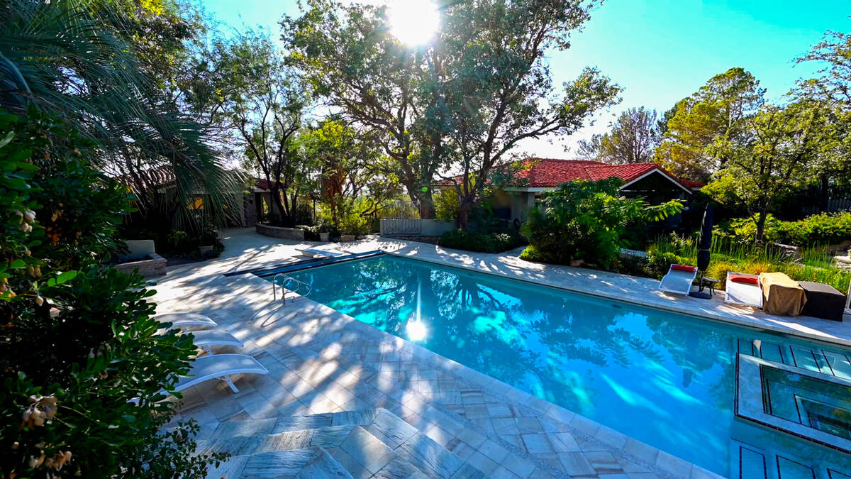 The backyard has lush landscaping. (The Desert Sun Realty)