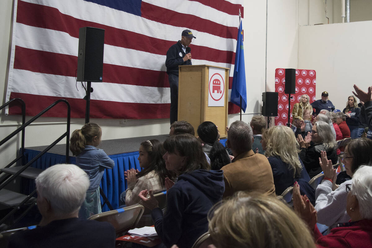 Florida Sen. Rick Scott, National Republican Senatorial Committee member, speaks to a rally in ...