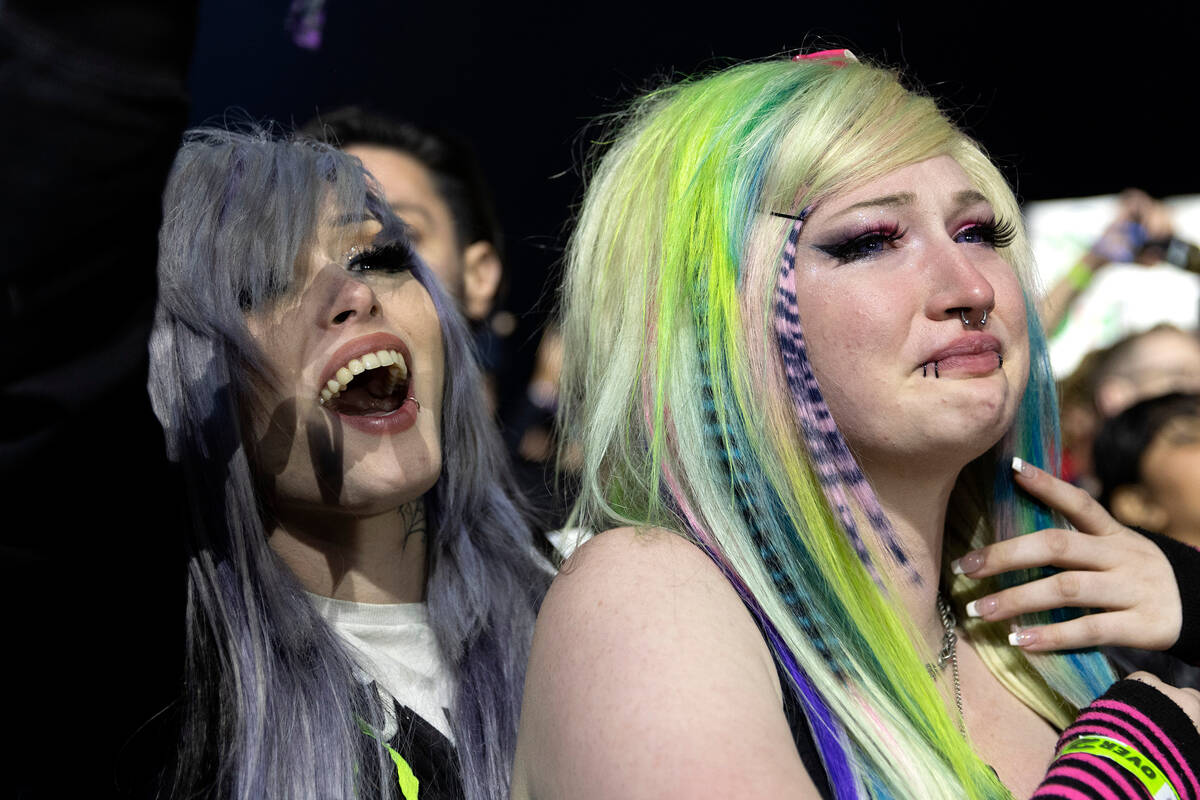 Fans react as Paramore comes onstage for their set during When We Were Young music festival at ...