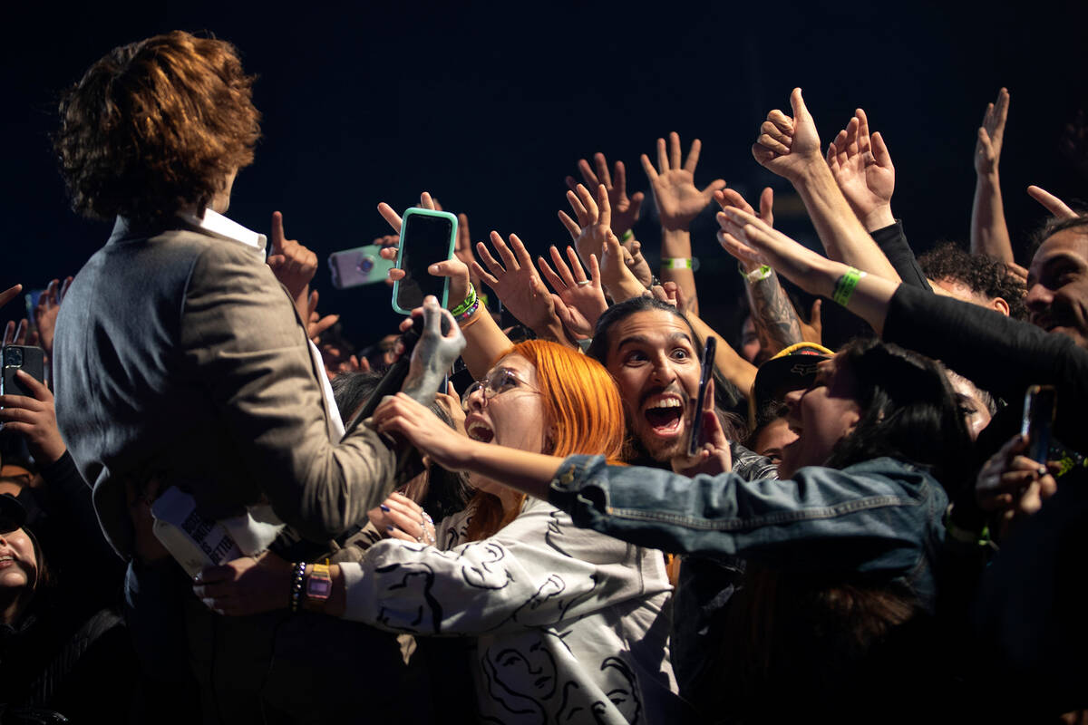 Fans go wild as Bring Me The Horizon’s lead singer Oliver Sykes moved off the stage for ...