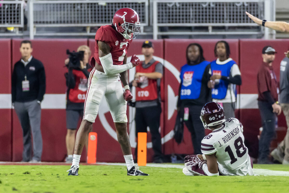 Alabama defensive back Eli Ricks (7) reacts after defending against Mississippi State wide rece ...