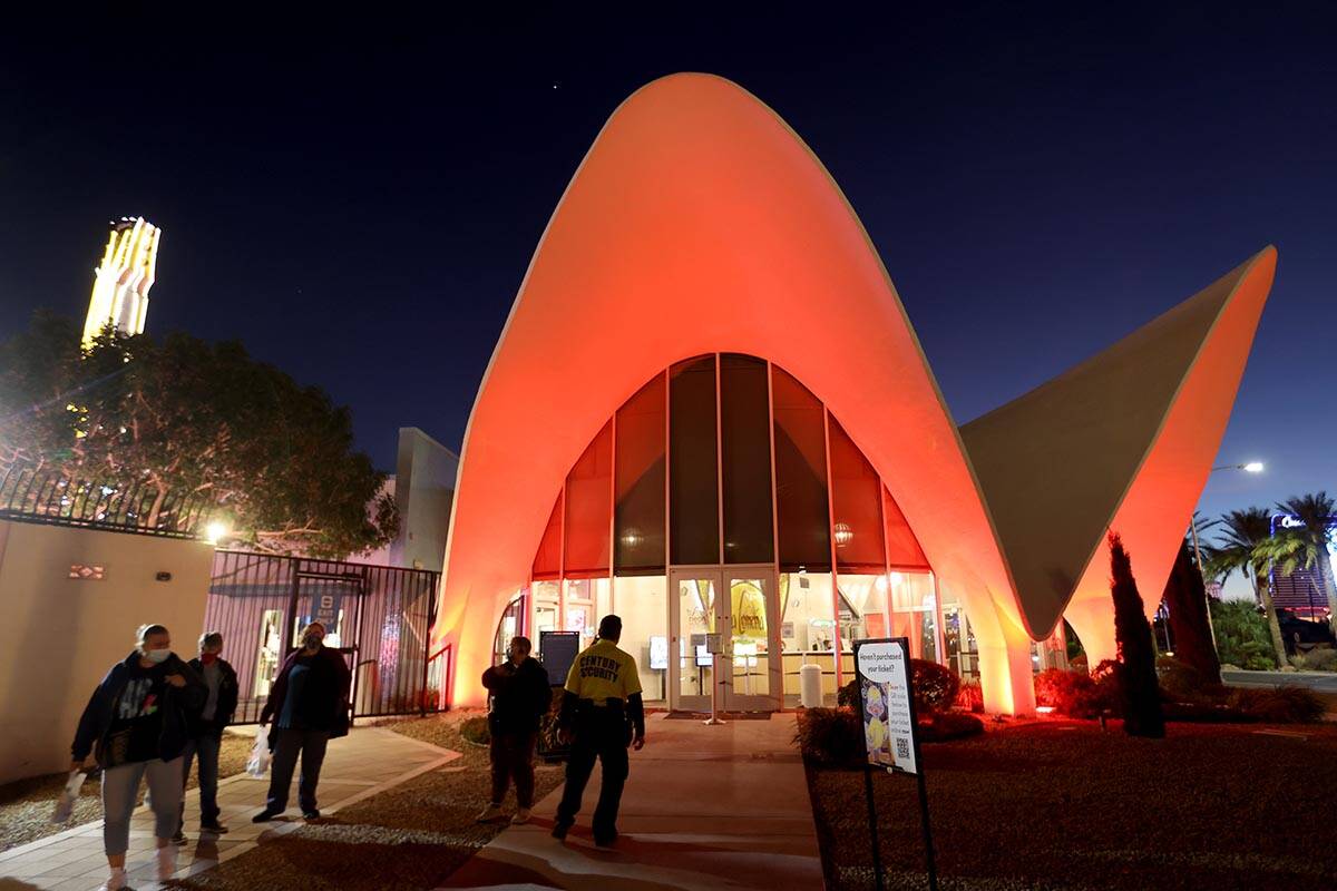 People enter the Neon Museum in downtown Las Vegas Sunday, Dec. 5, 2021. The COVID-19 pandemic ...