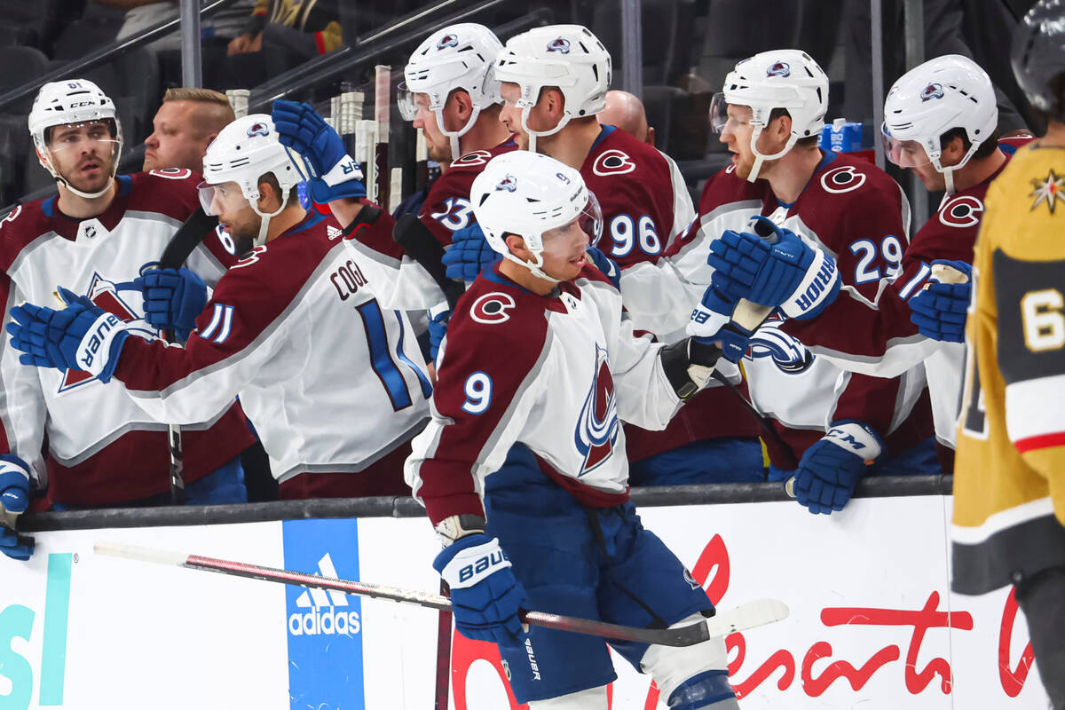Colorado Avalanche center Evan Rodrigues (9) is congratulated for his goal against the Vegas Go ...