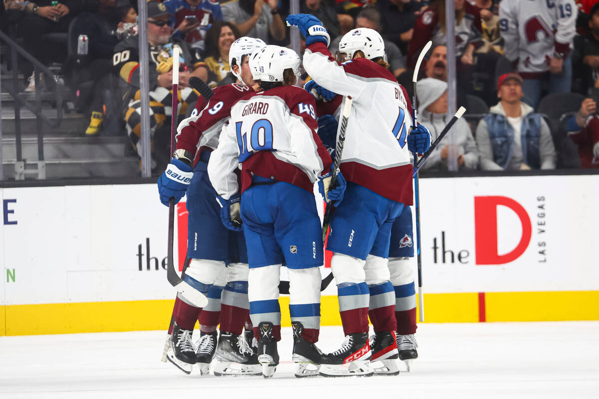 Colorado Avalanche players celebrate after a goal against the Vegas Golden Knights during the s ...