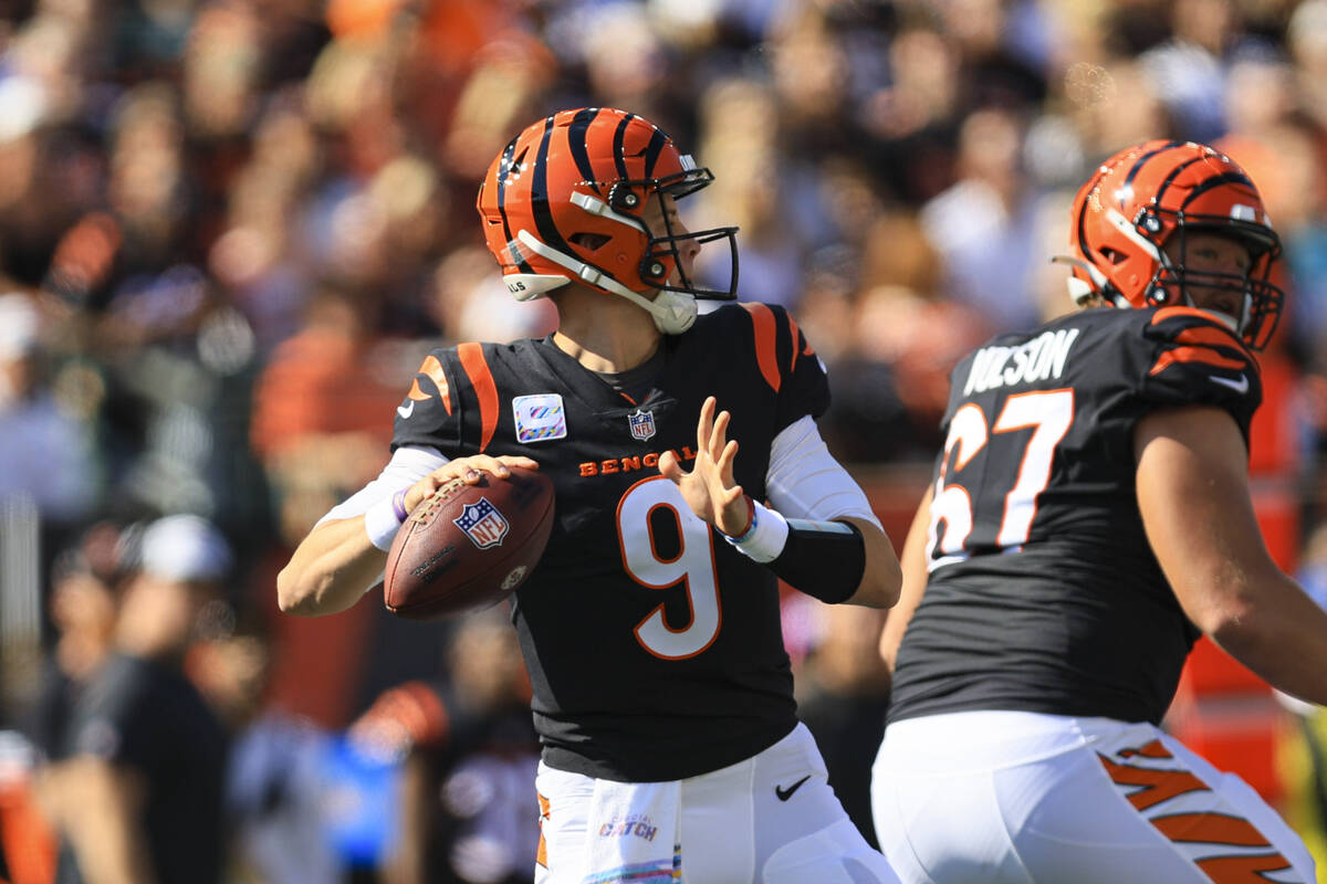 Cincinnati Bengals quarterback Joe Burrow (9) throws a pass for a touchdown against the Atlanta ...