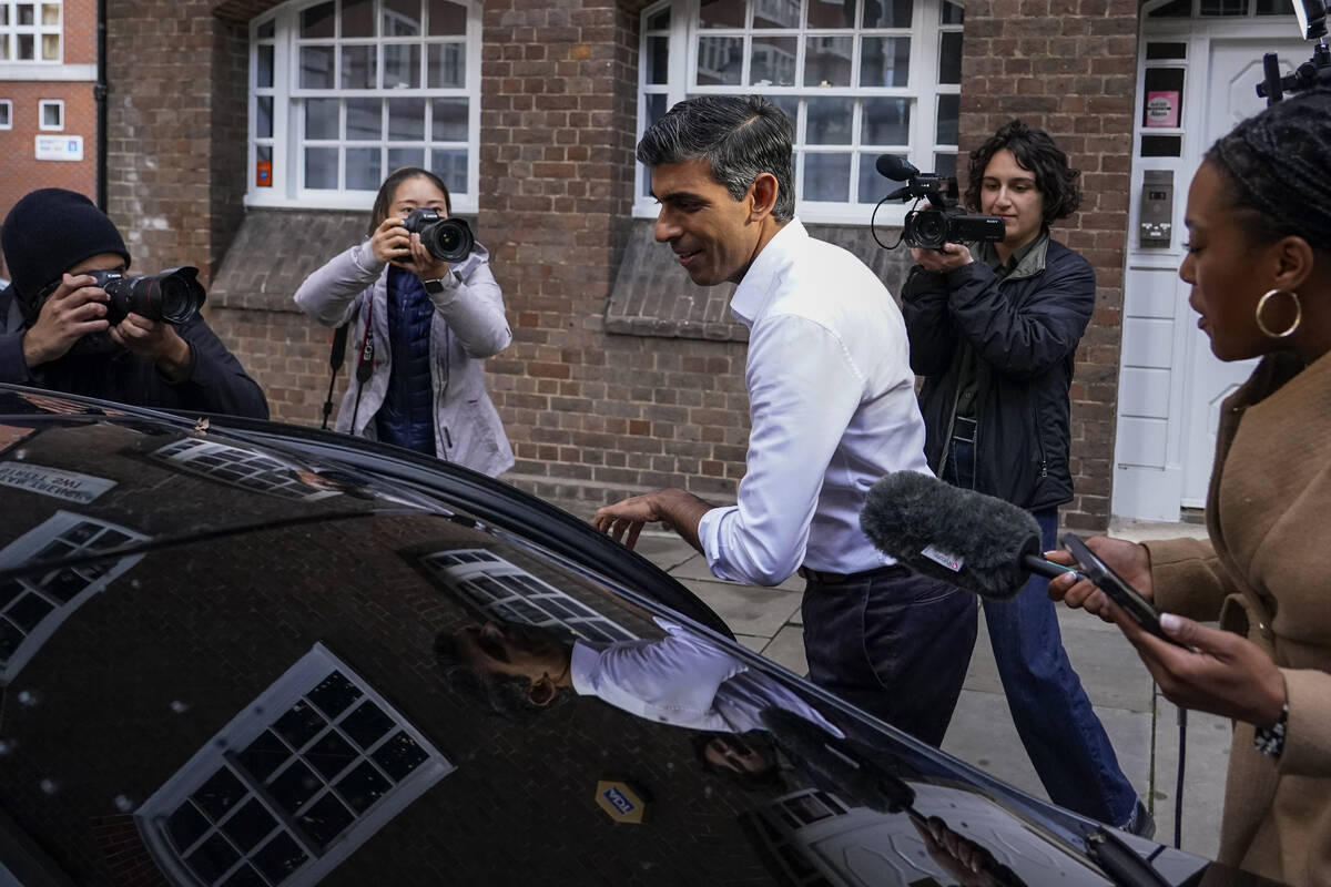 Conservative Party leadership candidate Rishi Sunak leaves his campaign office, in London, Sund ...