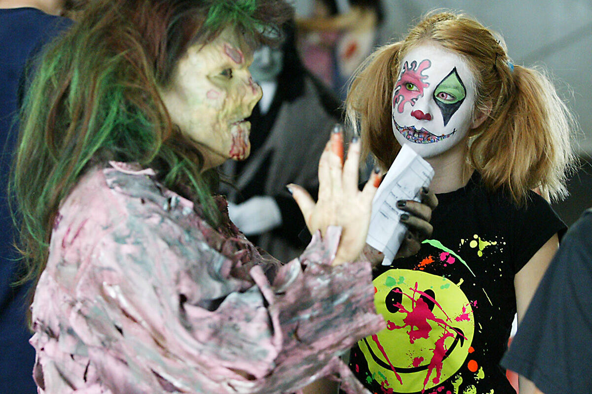 Jenn Botzenhart, left, and Amanda Shannan wait to audition for the Fright Dome on Saturday, Sep ...