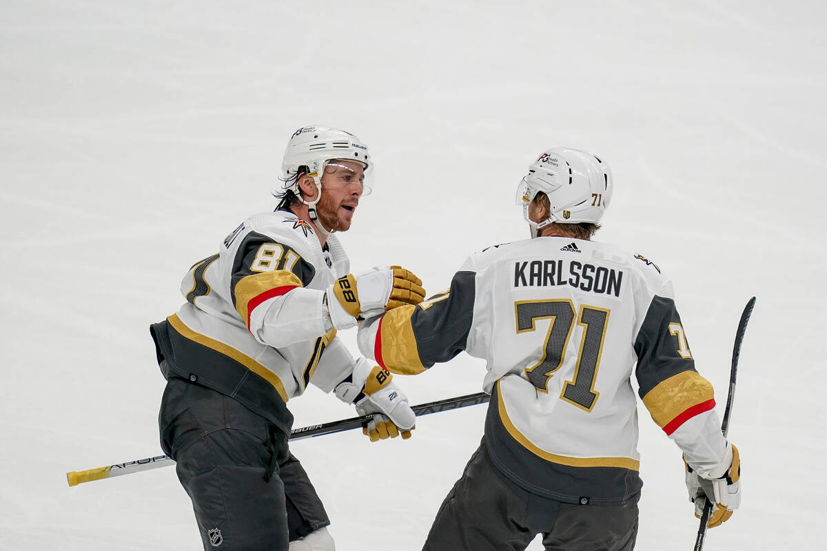 Vegas Golden Knights center Jonathan Marchessault (81) congratulates William Karlsson (71) afte ...