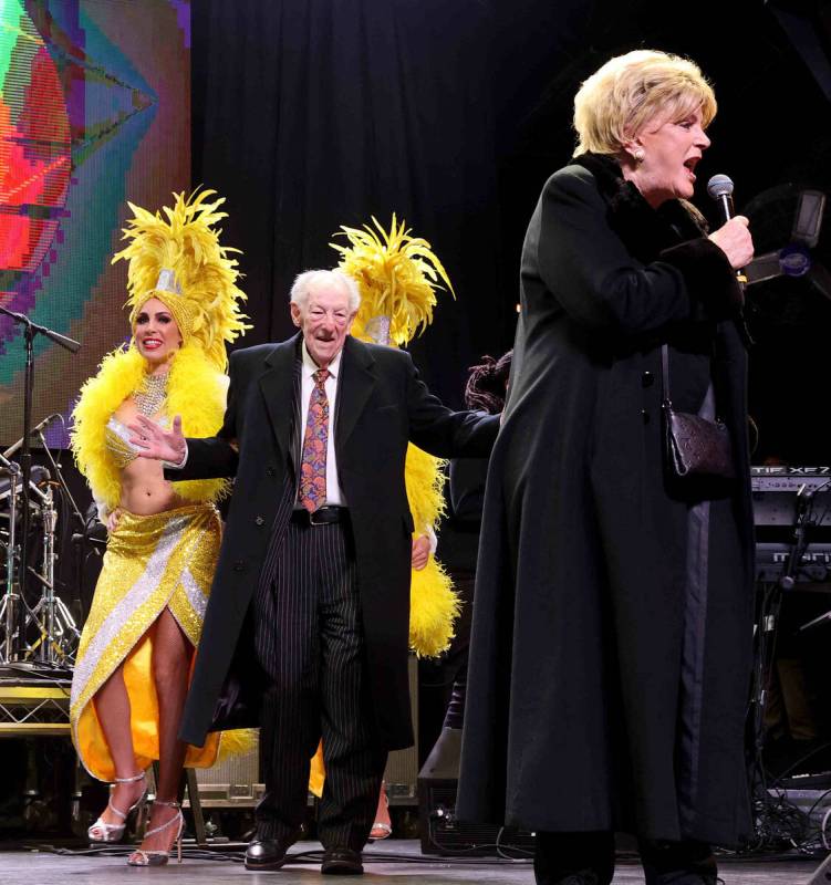 Former Mayor Oscar Goodman joins his wife, Mayor Carolyn Goodman just before midnight on the Th ...