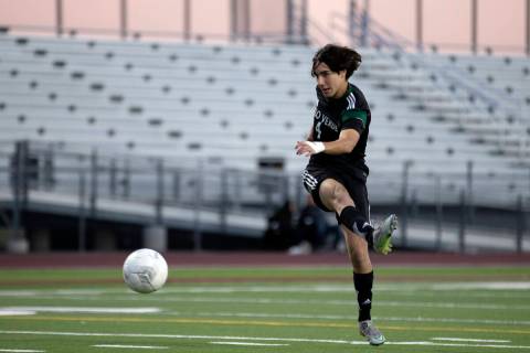 Palo Verde’s Yuval Cohen (4) warms up before a boys high school soccer game against Cima ...