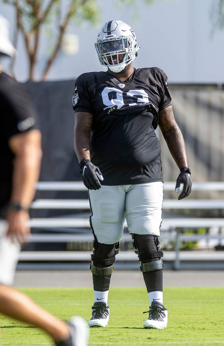 Raiders defensive tackle Neil Farrell Jr. (93) looks to teammates during practice at the Interm ...
