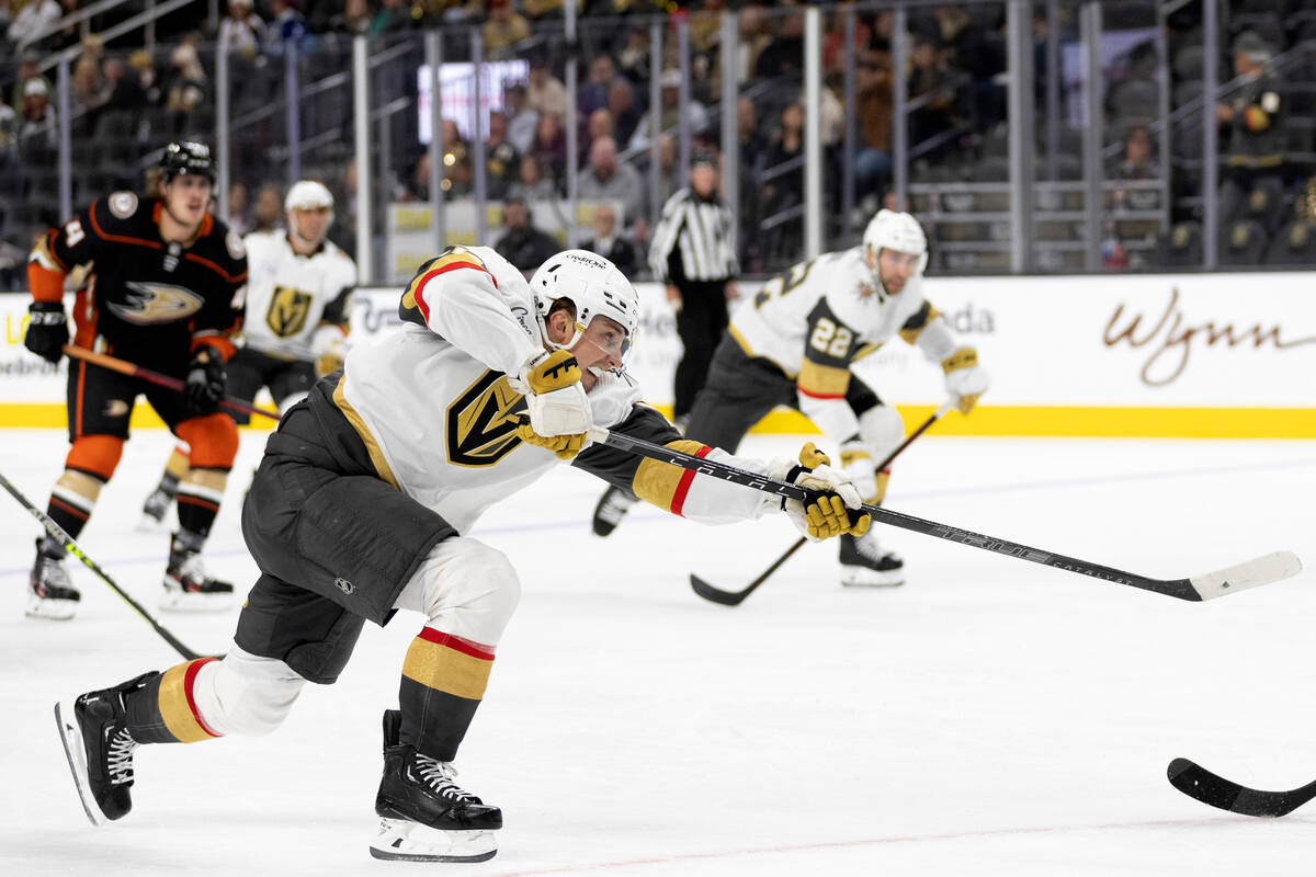 Golden Knights center Jake Leschyshyn (15) takes a shot on goal during the third period of an N ...