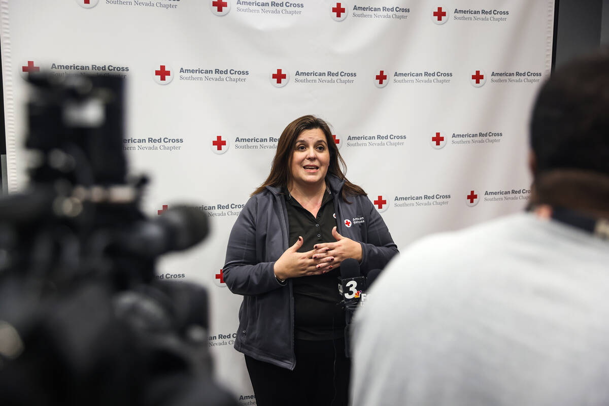 Rachel Flanigan, executive director of the Red Cross of Southern Nevada, speaks to the media at ...