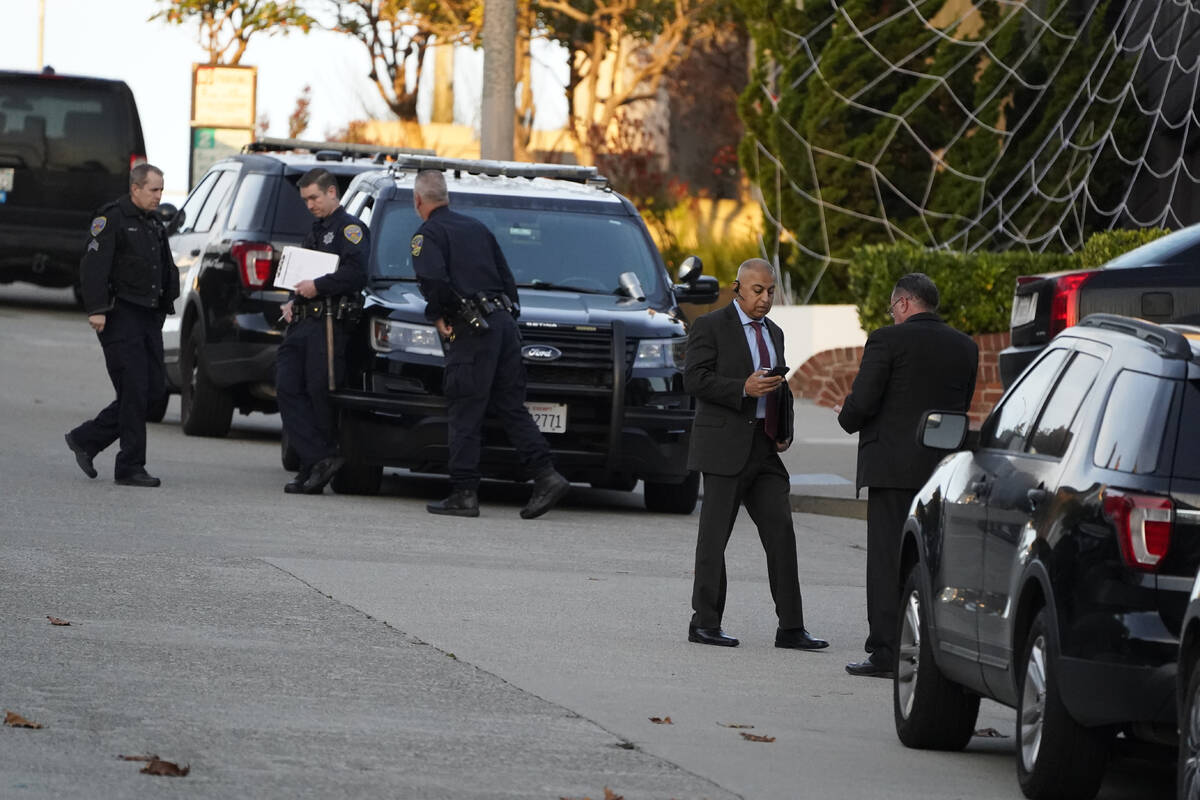 Police investigators work outside the home of Paul Pelosi, the husband of House Speaker Nancy P ...