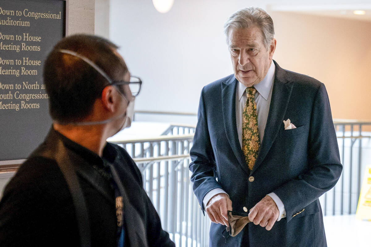 Paul Pelosi, right, the husband of House Speaker Nancy Pelosi, follows his wife as she arrives ...