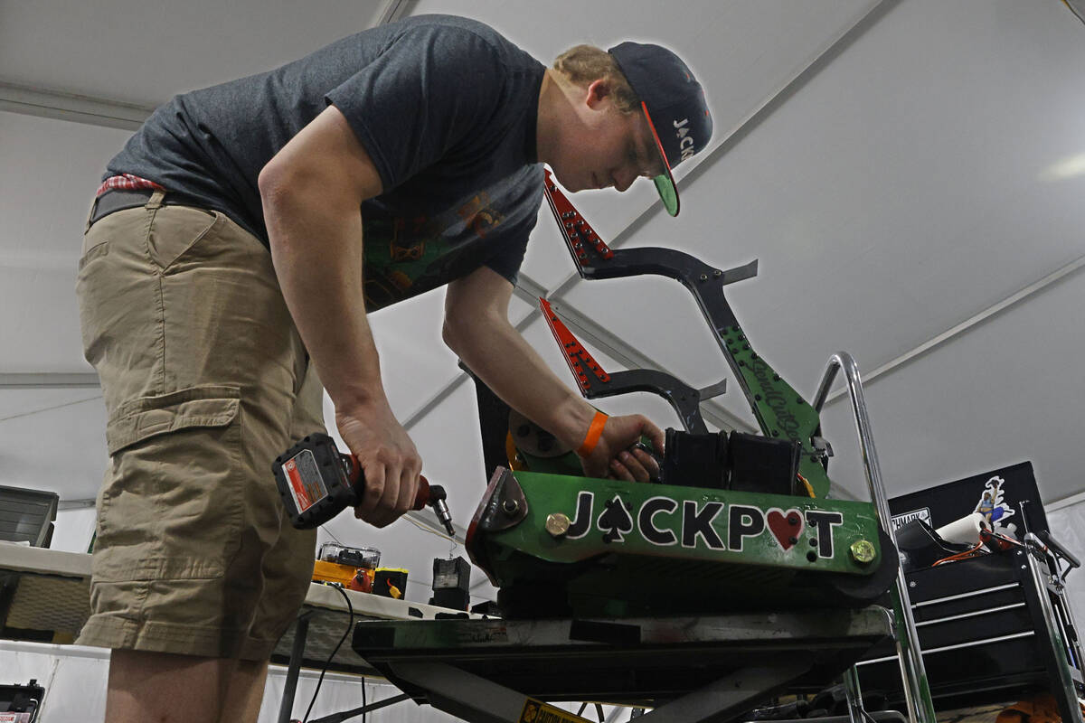 Vegas Combat Robotics team member Lucas Grell prepares their robot Jackpot for a battle in the ...