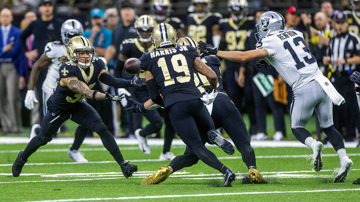 New Orleans Saints safety Tyrann Mathieu (32) looks to intercept a pass intended for Raiders wi ...