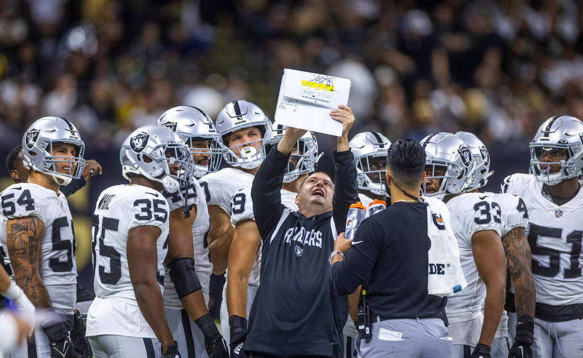 Raiders Special Teams Coach Tom McMahon instructs his players versus the New Orleans Saints dur ...