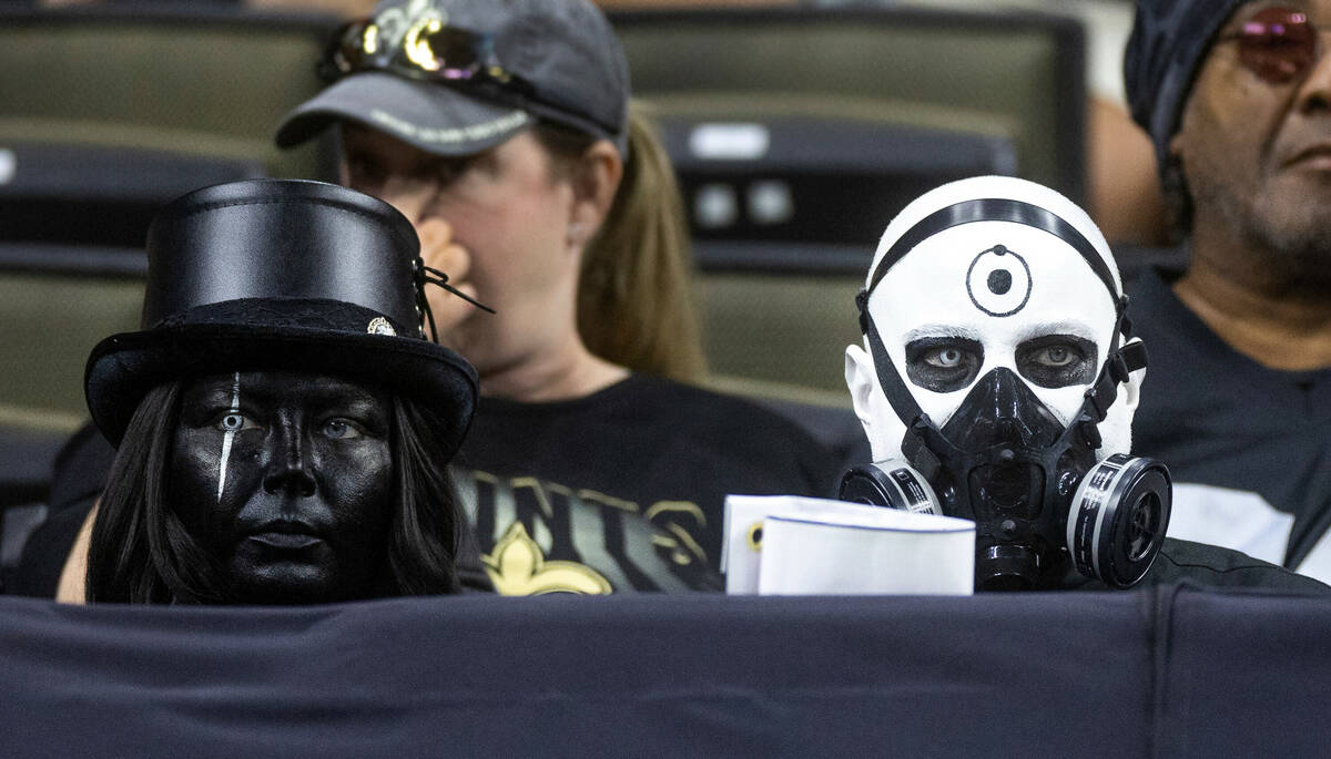 Raiders fans sit dejected as the New Orleans Saints shut them out during the second half of the ...