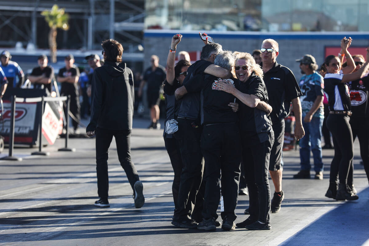 The team for Hector Arana cheers after he wins the Pro Stock Motorcycle race at the NHRA Nevada ...