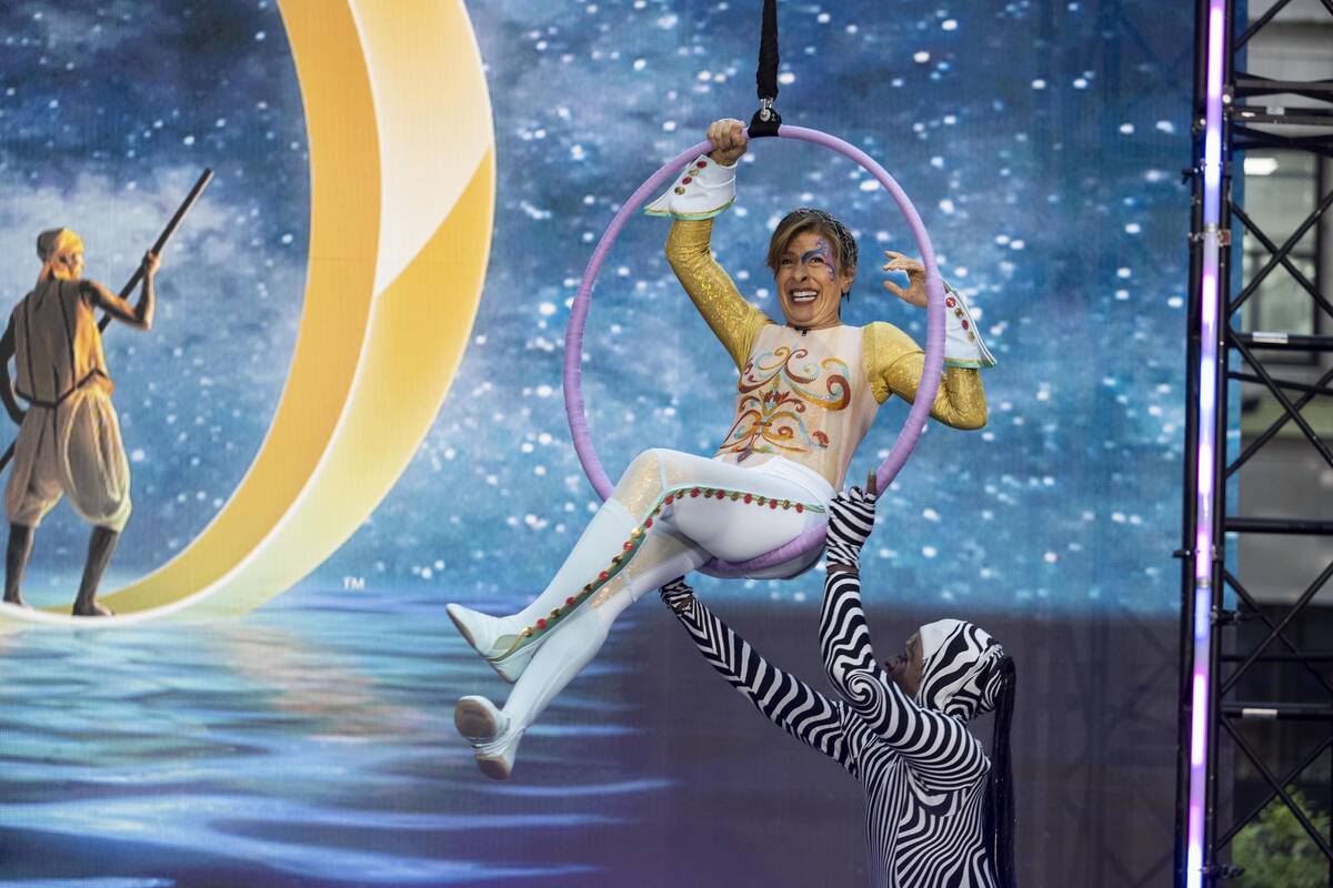 Hoda Kotb is shown working an aerial act from "O" in "Today in Vegas" on Oct. 31, 2022. (Nathan ...