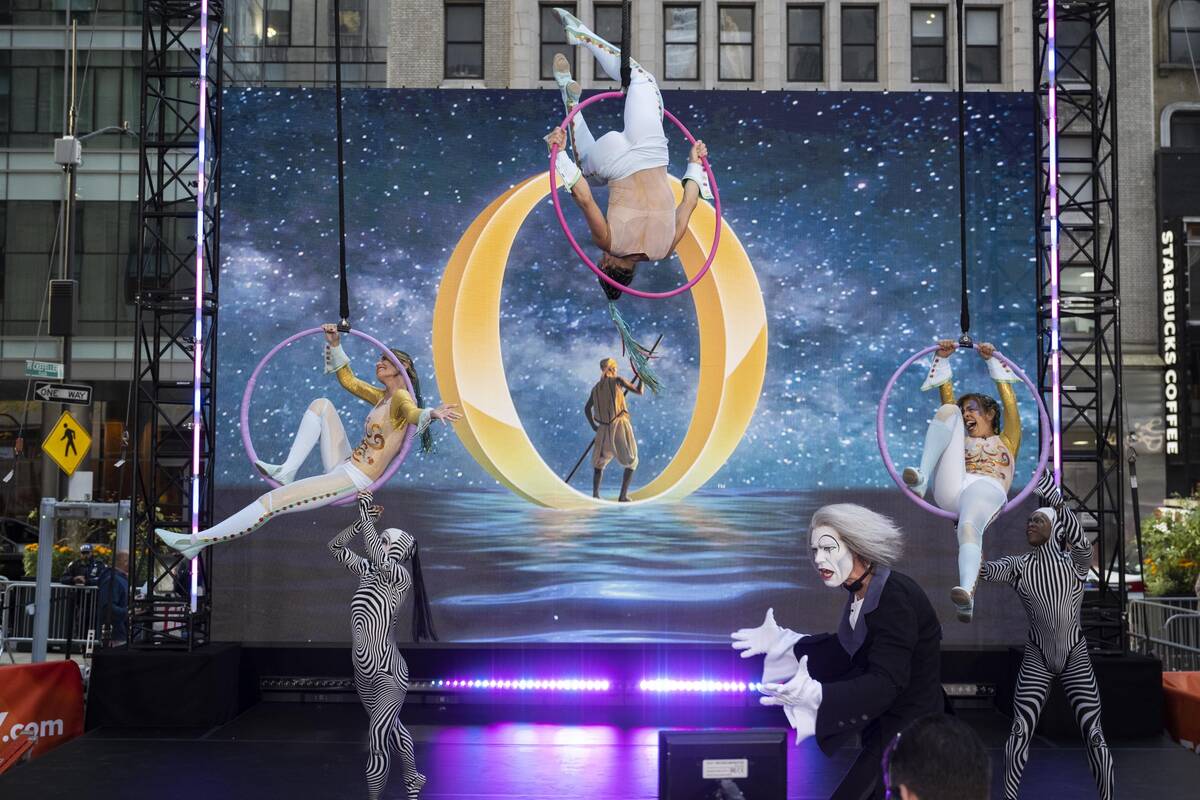 Savannah Guthrie and Hoda Kotb are shown working an aerial act from "O" in "Today in Vegas" on ...