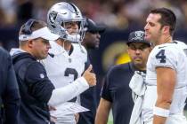 Raiders Head Coach Josh McDaniels with quarterback Jarrett Stidham (3) keeps this positive with ...