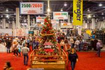 Individuals attend Cowboy Christmas at the Las Vegas Convention Center in Las Vegas on Thursday ...