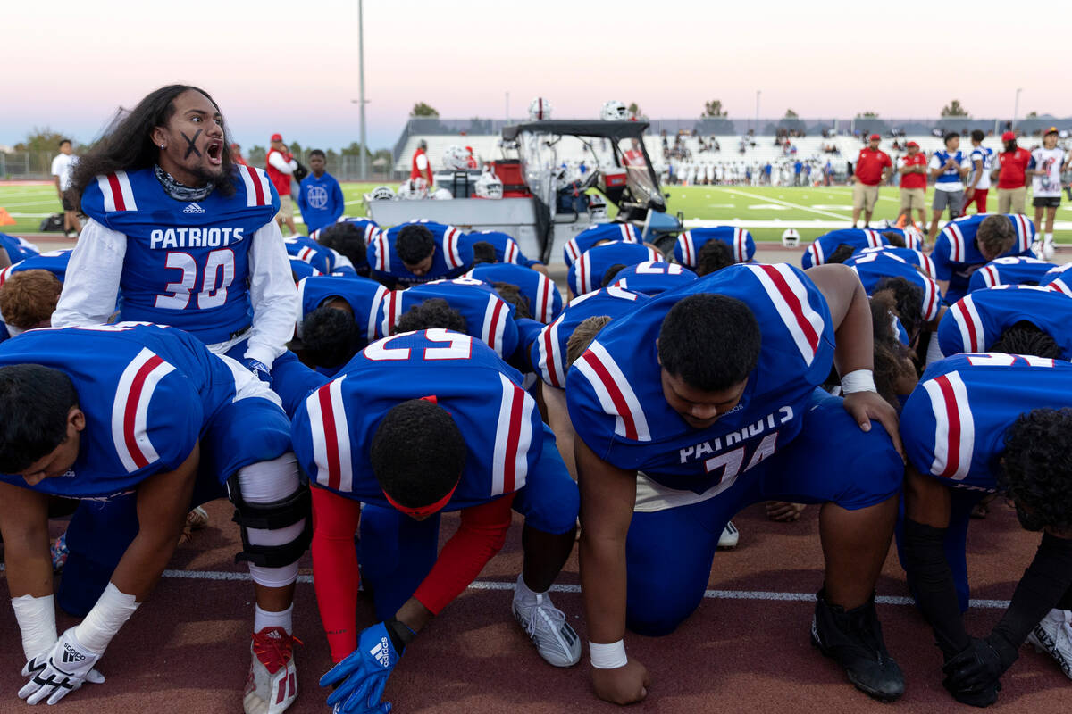 Liberty’s Tofiga Fiaseu leads the traditional haka dance before a Class 5A high school f ...