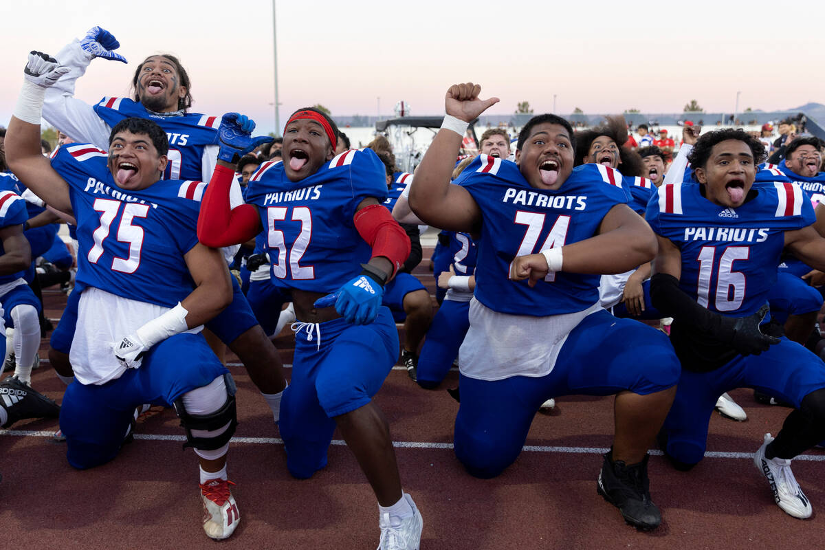 Liberty’s football team performs the traditional haka dance before a Class 5A high schoo ...