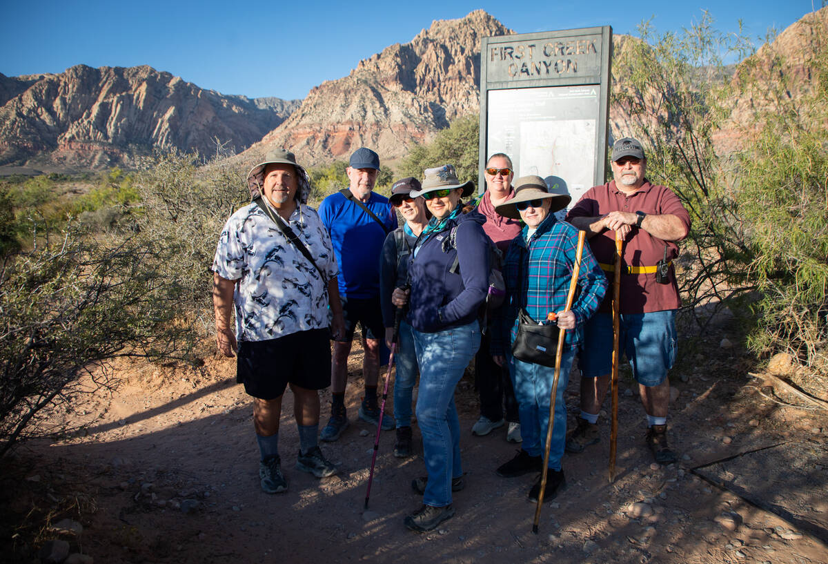 The Las Vegas Overweight Hikers for Health group members pose for a photo before taking an earl ...