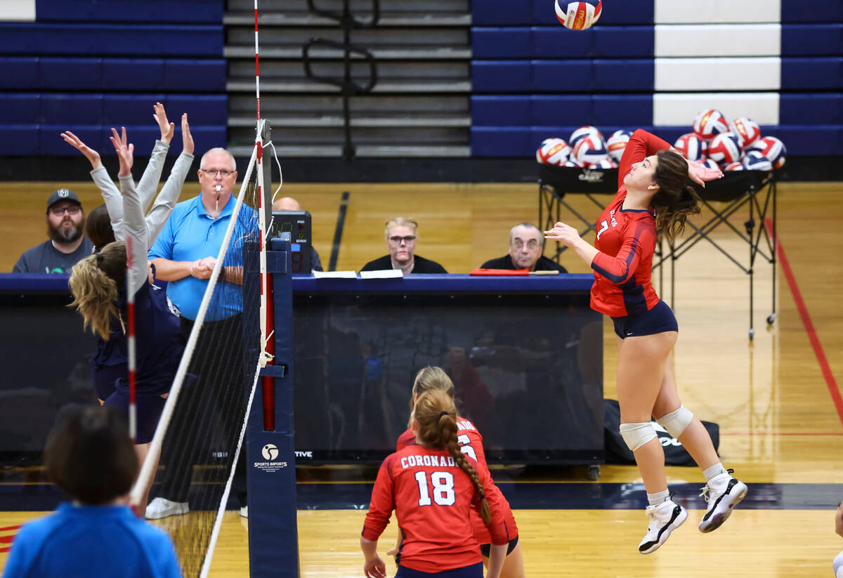 Coronado's Sarah Sullivan (7) looks to send the ball over the net against Shadow Ridge during a ...