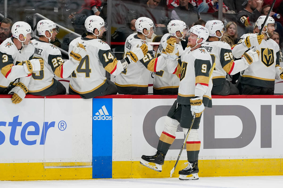 Vegas Golden Knights center Jack Eichel (9) celebrates his goal with teammates in the first per ...