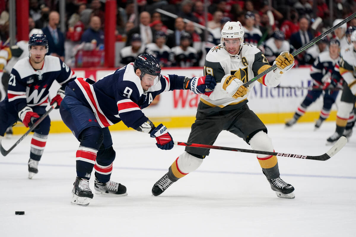 Washington Capitals defenseman Dmitry Orlov, left, and Vegas Golden Knights right wing Reilly S ...