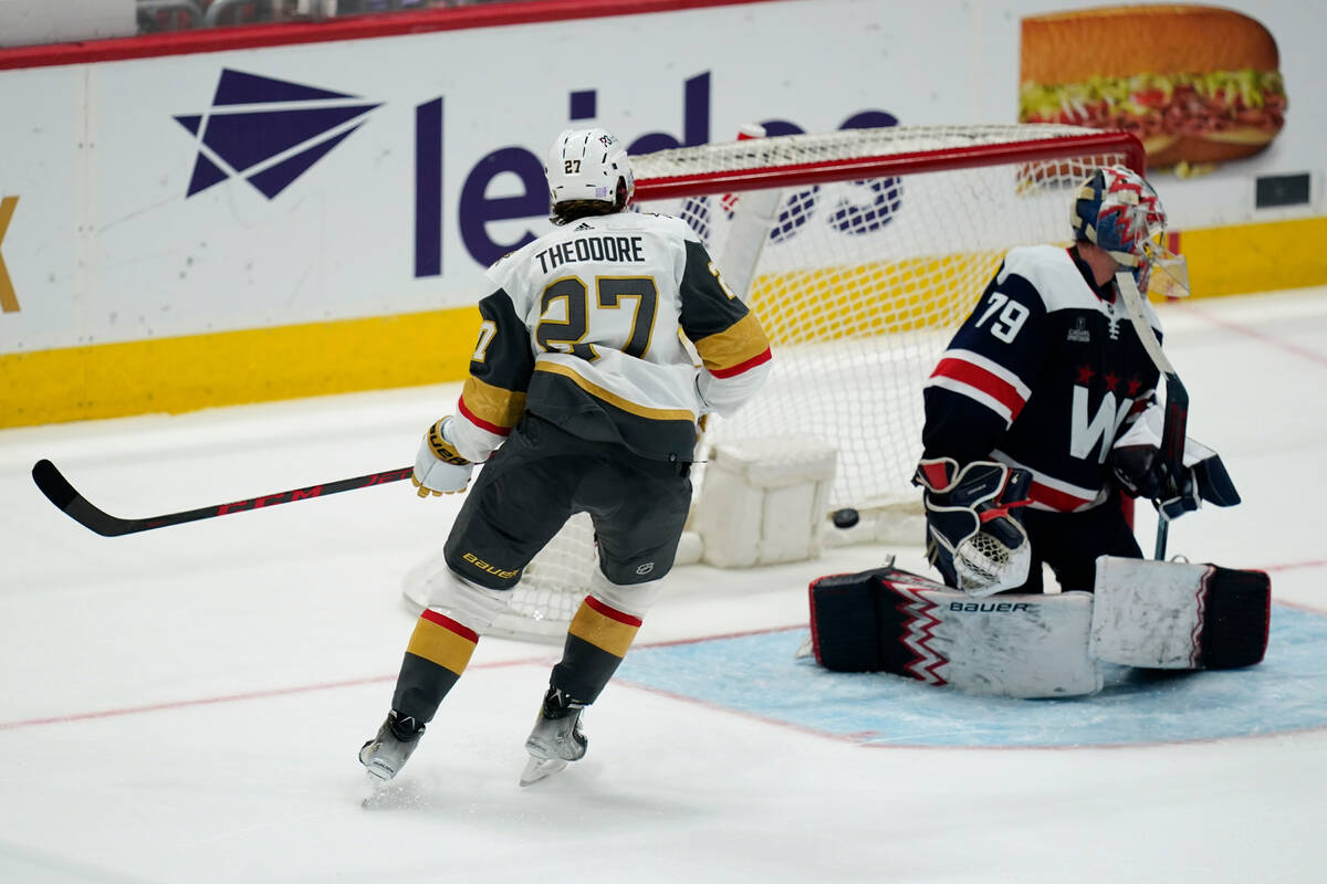 Vegas Golden Knights' Shea Theodore scores a goal against Washington Capitals goaltender Charli ...