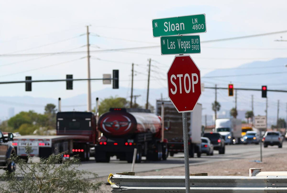 Traffic passes by the intersection of Sloan Lane at North Las Vegas Boulevard, which is slated ...