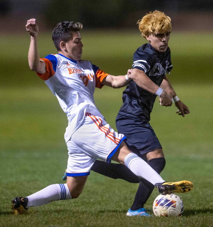 Bishop Gorman's Orlando Villegas Jr (19) steals the ball from Cimarron's Jecsan Villasenor (10) ...