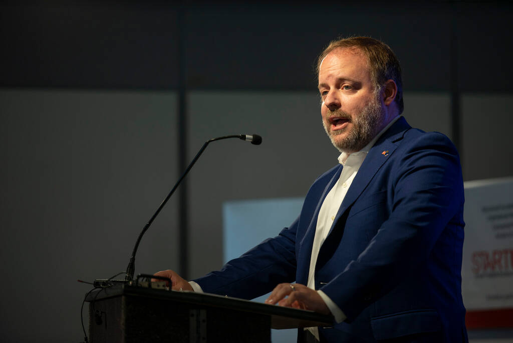 Nevada Treasurer Zach Conine speaks at a press conference at the International Innovation Cente ...