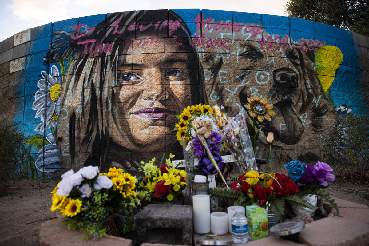 A mural painted in memory of Tina Tintor and her dog, Max, who were killed in a car crash invol ...