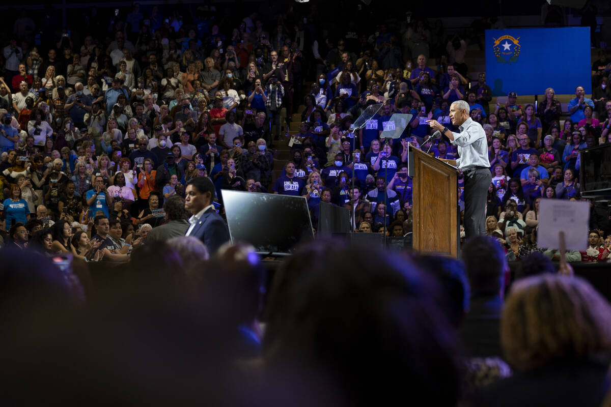 Former President Barack Obama speaks during a campaign rally organized by Nevada Democratic Vic ...