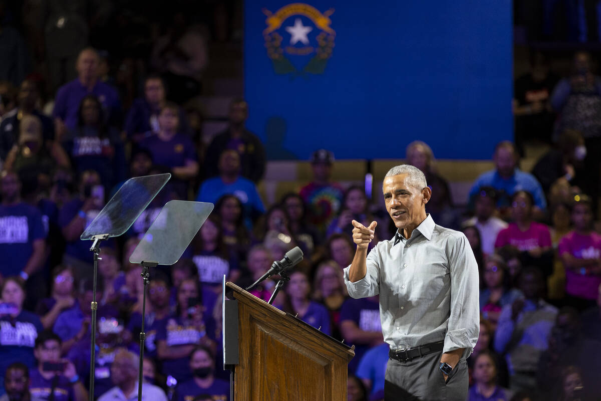 Former President Barack Obama speaks during a campaign rally organized by Nevada Democratic Vic ...